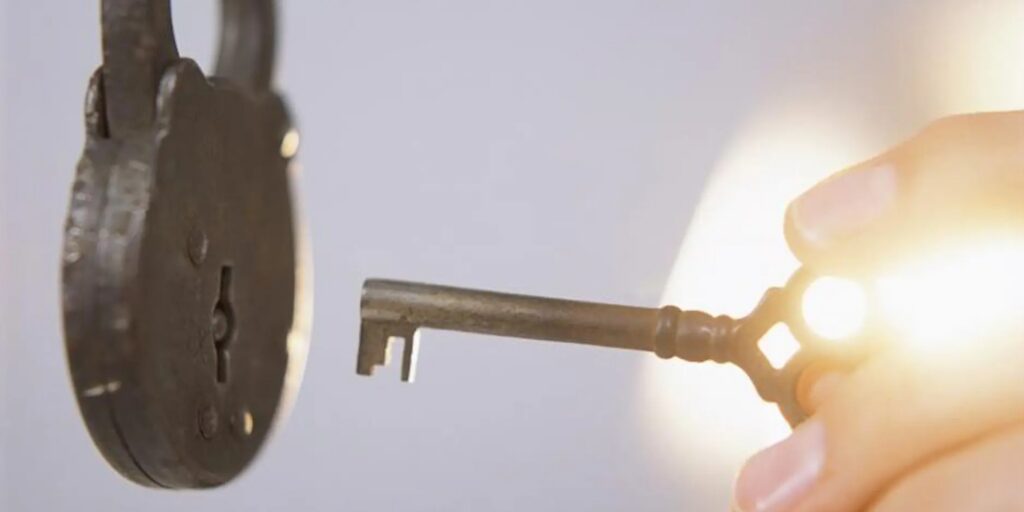 photo of key being inserted into a lock
