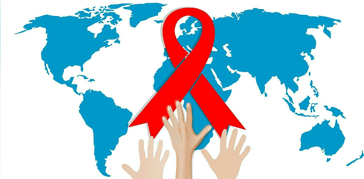 Map of the earth with a red ribbon over it and hands reaching up to the ribbon